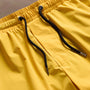 Technical Stretch Nylon Split Hem Boardshort in Crocus Yellow | James Perse Los Angeles